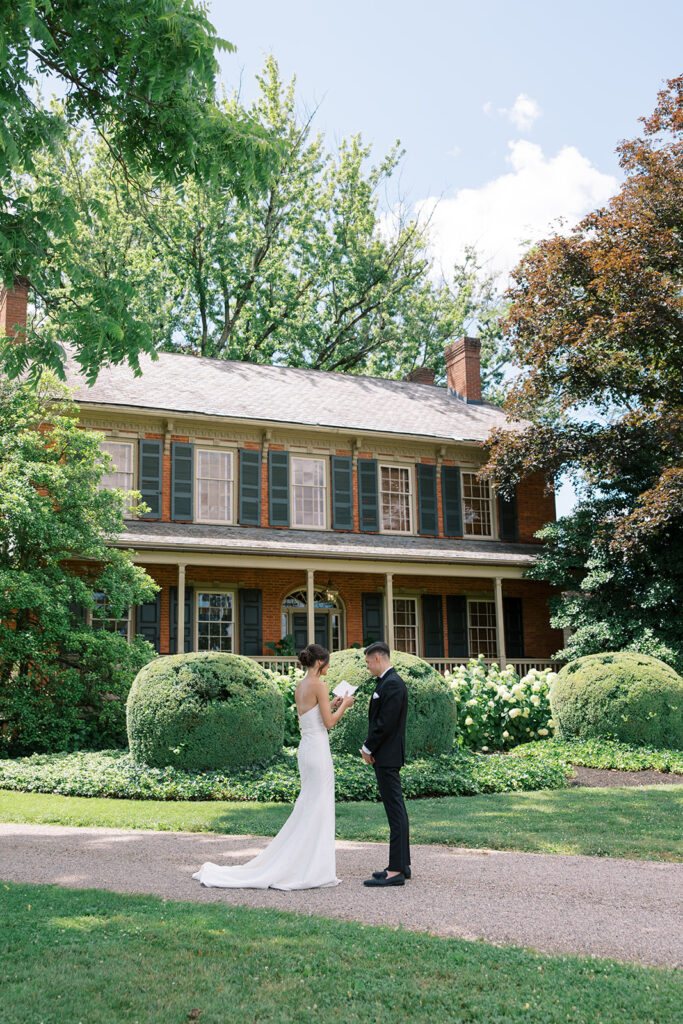 Private vows in front of The Cypress House